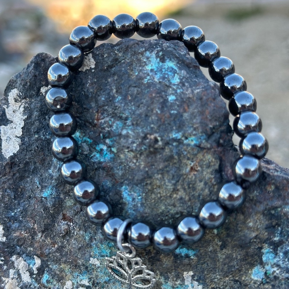 Healing Hematite Polished Black Beads with Silver Charm.